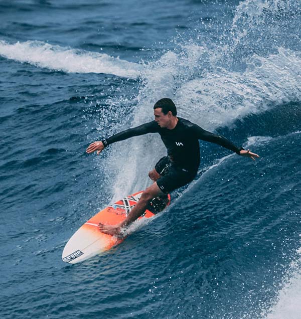 Man-surfing-maui